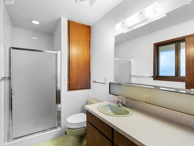 15416 NE Holladay St, Portland, OR 97230 - bathroom with recessed lighting, vanity, a shower stall, and toilet