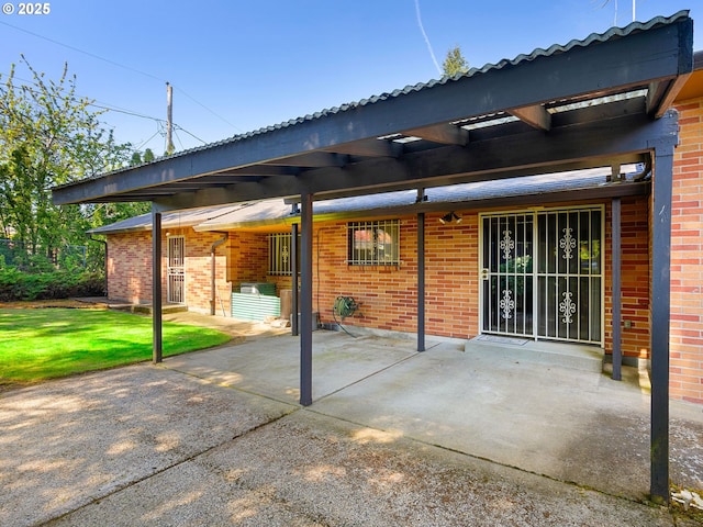 15416 NE Holladay St, Portland, OR 97230 - back of house featuring brick siding and a yard