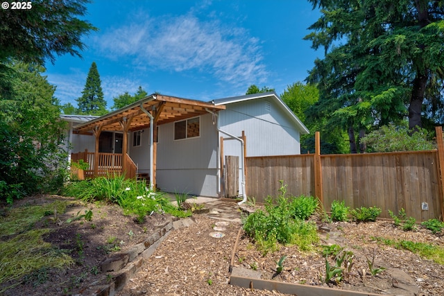 1378 SW Taylors Ferry Ct, Portland, OR 97219 - rear view of house with a wooden deck