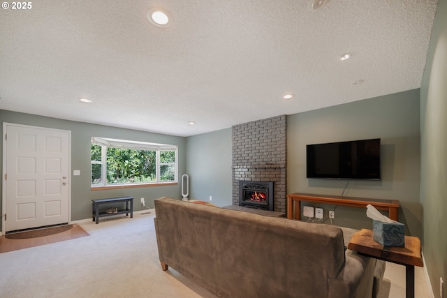 1378 SW Taylors Ferry Ct, Portland, OR 97219 - living area featuring a brick fireplace, a textured ceiling, light colored carpet, and recessed lighting