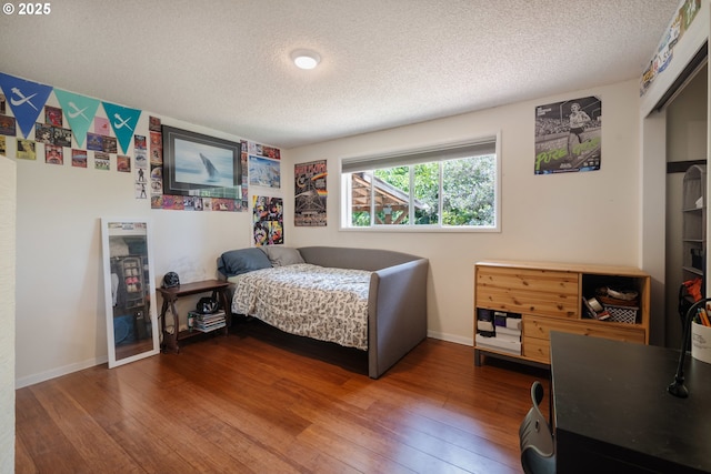 1378 SW Taylors Ferry Ct, Portland, OR 97219 - bedroom featuring a textured ceiling and hardwood / wood-style flooring