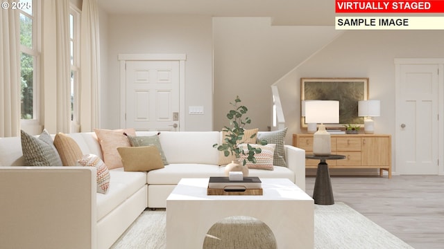 living room with light hardwood / wood-style flooring