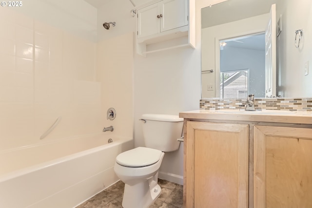 full bath with vanity, decorative backsplash, toilet, and shower / tub combination