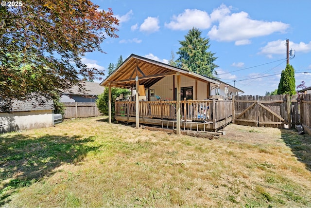 169 W 2nd St, Lafayette, OR 97127 - back of house featuring a fenced backyard and a wooden deck