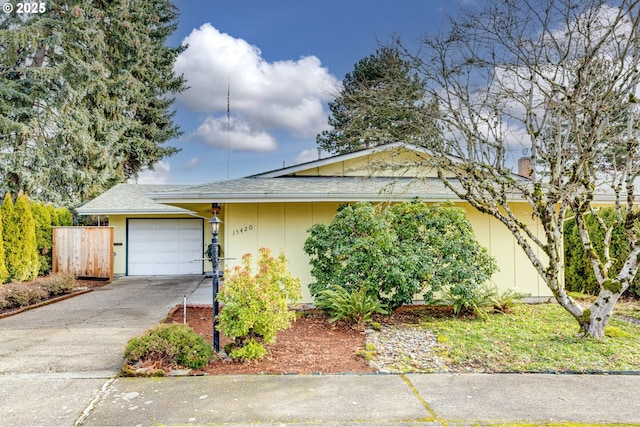 single story home featuring a garage