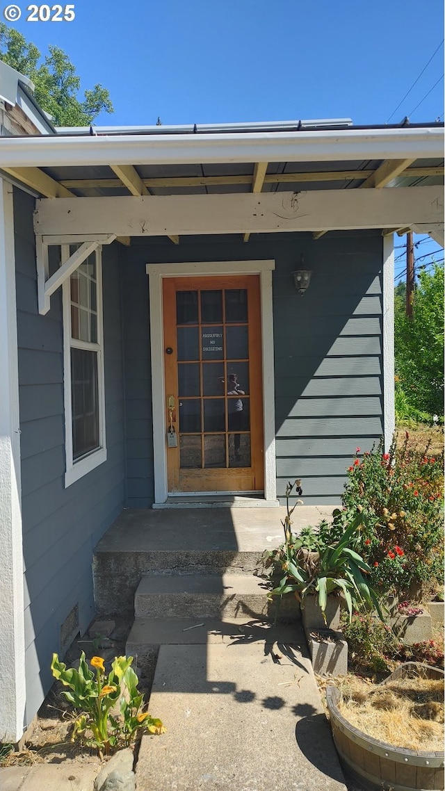 317 S Cedar St, Drain, OR 97435 - doorway to property featuring covered porch
