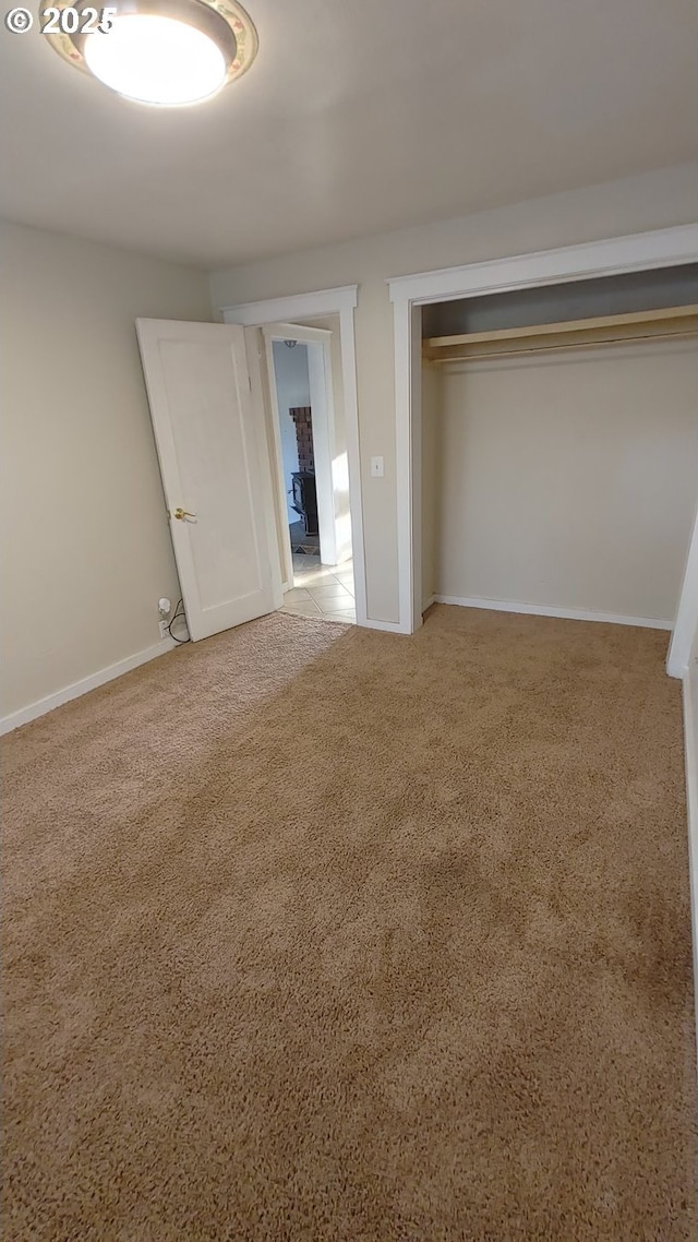317 S Cedar St, Drain, OR 97435 - unfurnished bedroom featuring light carpet and a closet