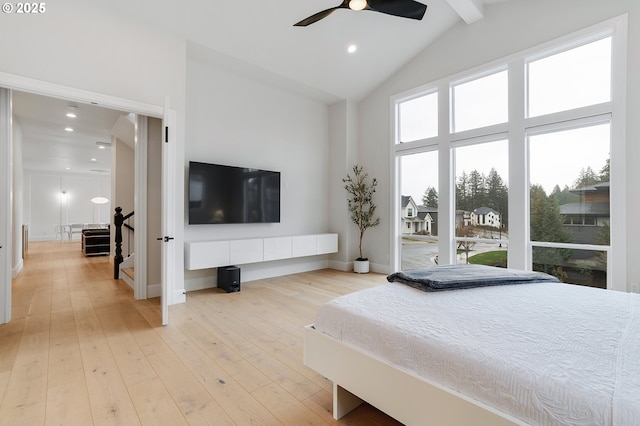 bedroom featuring recessed lighting, baseboards, wood-type flooring, and high vaulted ceiling