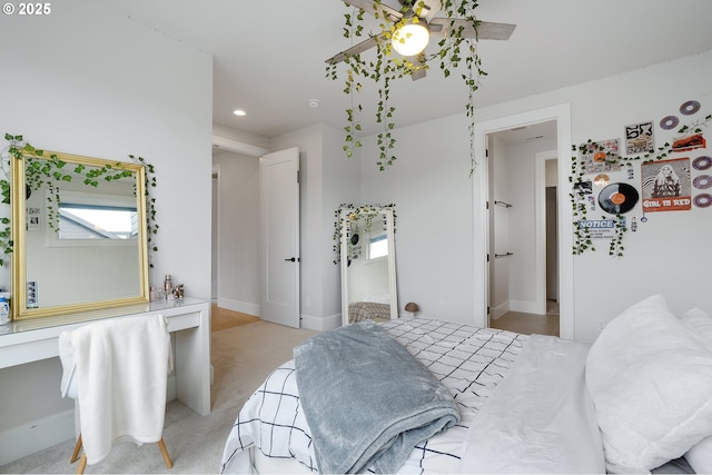 bedroom featuring recessed lighting, baseboards, and light carpet