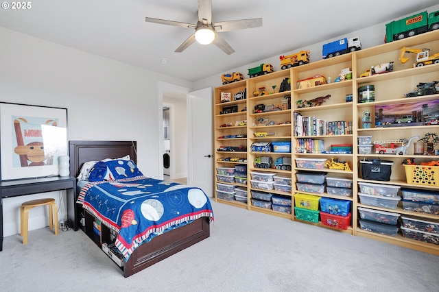 bedroom with ceiling fan and carpet flooring