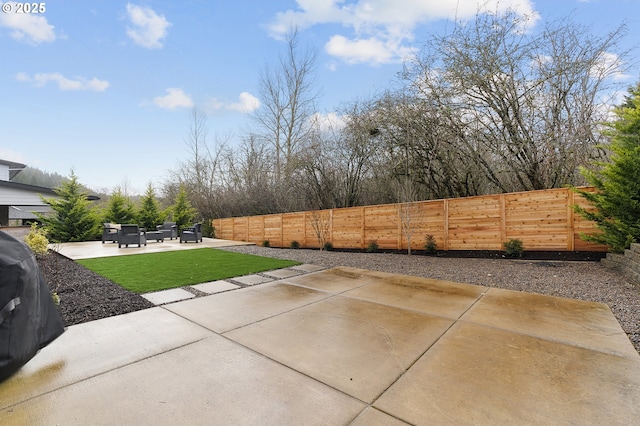 view of patio / terrace with an outdoor hangout area and fence private yard