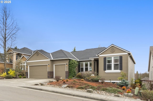 view of front facade featuring an attached garage, concrete driveway, and brick siding