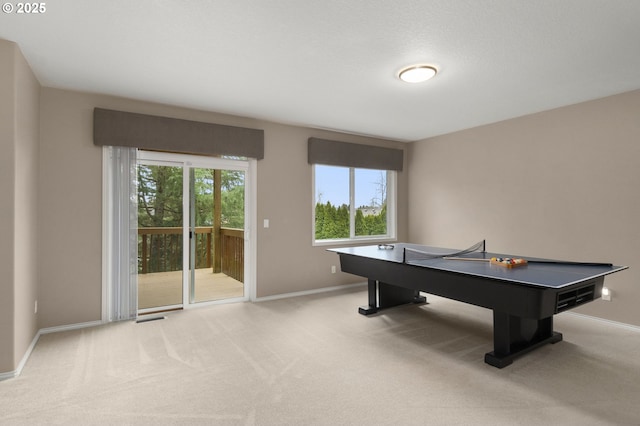 game room with carpet flooring, baseboards, and visible vents