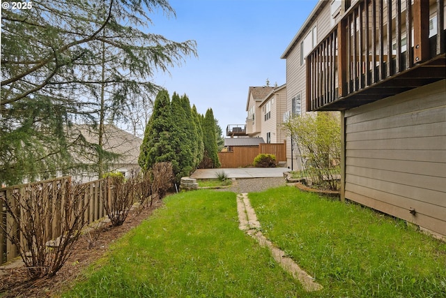 view of yard featuring a patio area and fence