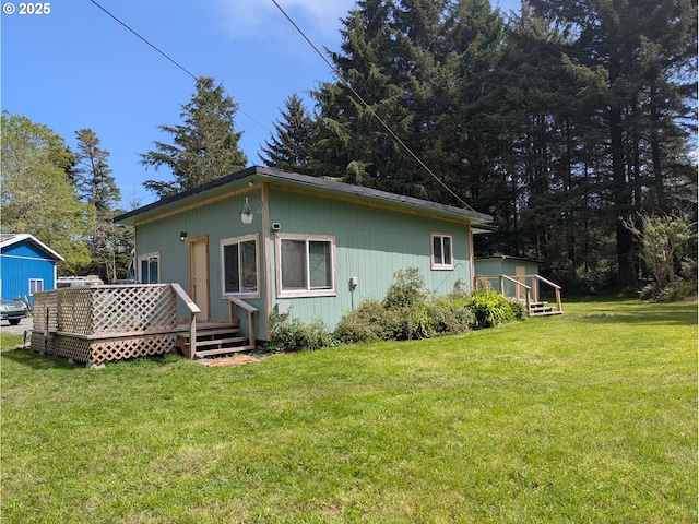 63579 Seven Devils Rd, Coos Bay, OR 97420 - back of house with a deck and a yard