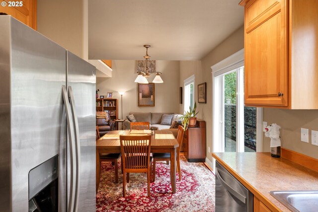 dining space with a chandelier