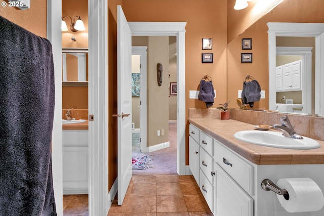 bathroom with vanity and tile patterned flooring
