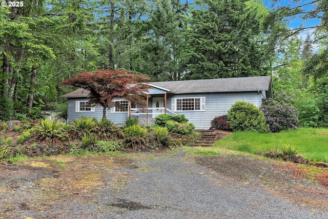 24344 NW Meacham Rd, North Plains, OR 97133 - view of front of property featuring a porch and a shingled roof