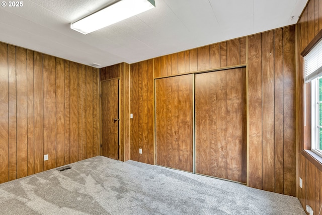24344 NW Meacham Rd, North Plains, OR 97133 - carpeted empty room featuring wooden walls
