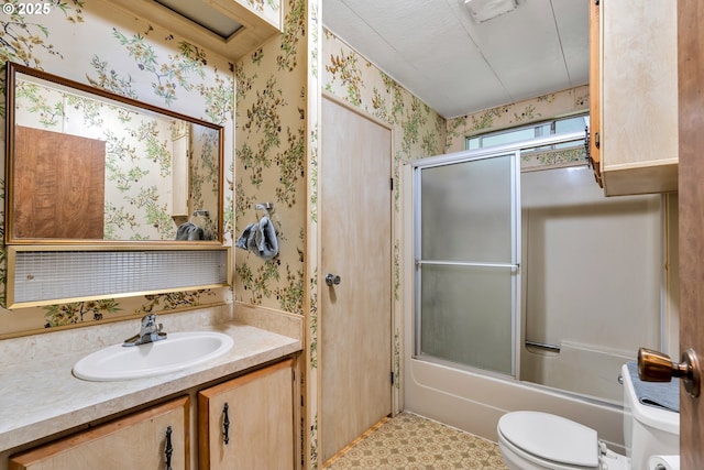 24344 NW Meacham Rd, North Plains, OR 97133 - bathroom with wallpapered walls, toilet, vanity, and combined bath / shower with glass door