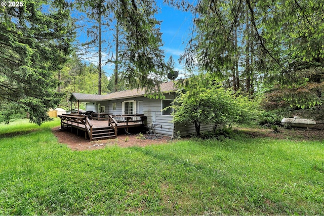 24344 NW Meacham Rd, North Plains, OR 97133 - view of green lawn with a deck