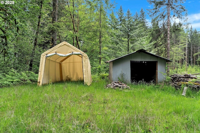 24344 NW Meacham Rd, North Plains, OR 97133 - view of outdoor structure with a forest view