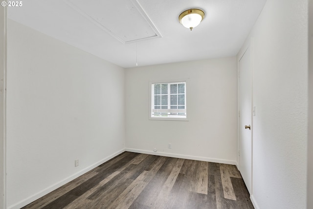 24344 NW Meacham Rd, North Plains, OR 97133 - empty room with attic access, dark wood-style floors, and baseboards