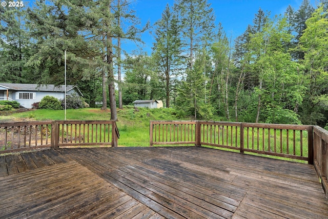 24344 NW Meacham Rd, North Plains, OR 97133 - wooden terrace featuring an outdoor structure and a lawn