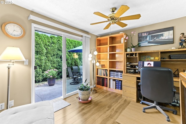 1018 S Holly Ct, Canby, OR 97013 - office area with wood finished floors and a ceiling fan