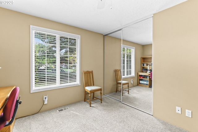 1018 S Holly Ct, Canby, OR 97013 - sitting room with carpet floors and ceiling fan