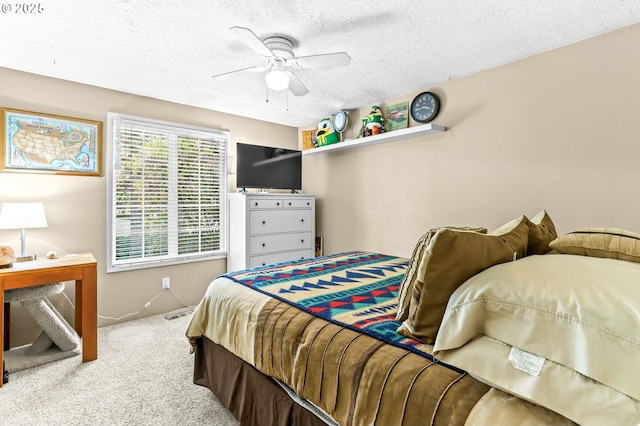 1018 S Holly Ct, Canby, OR 97013 - carpeted bedroom featuring a textured ceiling and a ceiling fan