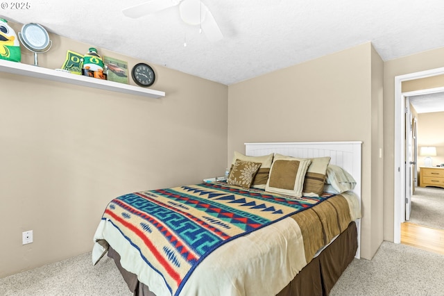 1018 S Holly Ct, Canby, OR 97013 - carpeted bedroom with ceiling fan and a textured ceiling