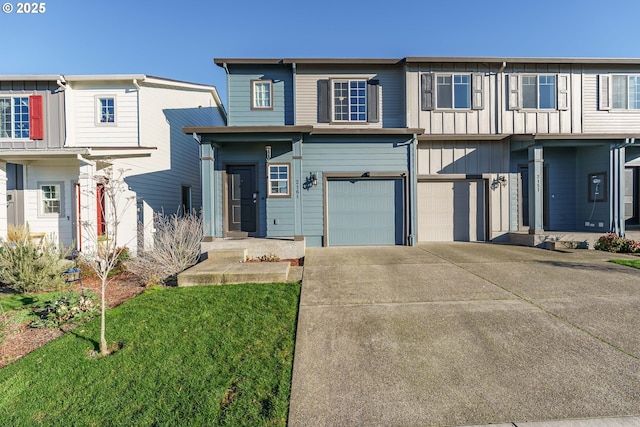 view of front facade with a front lawn and a garage