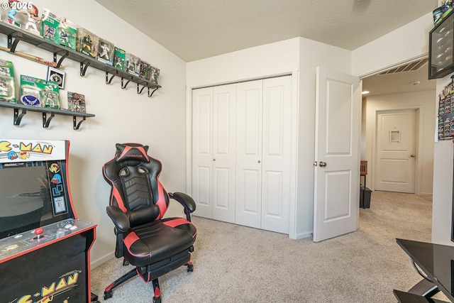 living area featuring light carpet