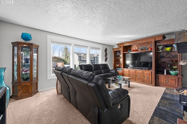 35363 Woodland Ln, Astoria, OR 97103 - living room featuring a textured ceiling and visible vents