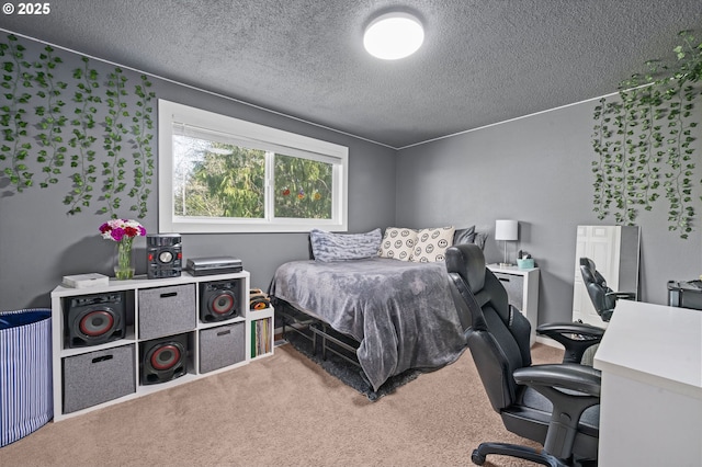 35363 Woodland Ln, Astoria, OR 97103 - carpeted bedroom featuring a textured ceiling