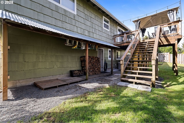 35363 Woodland Ln, Astoria, OR 97103 - exterior space featuring a yard, fence, stairway, and a deck