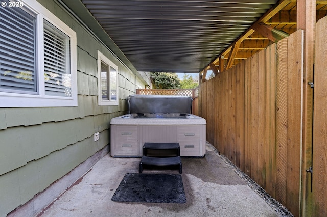 35363 Woodland Ln, Astoria, OR 97103 - view of patio with fence and a hot tub