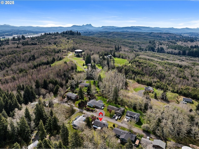 35363 Woodland Ln, Astoria, OR 97103 - birds eye view of property with a wooded view and a mountain view
