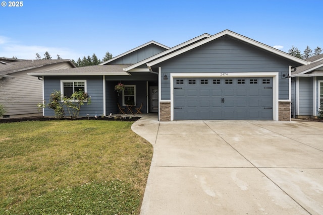 2474 Equestrian Loop S, Salem, OR 97302 - ranch-style house featuring driveway, an attached garage, board and batten siding, and a front yard