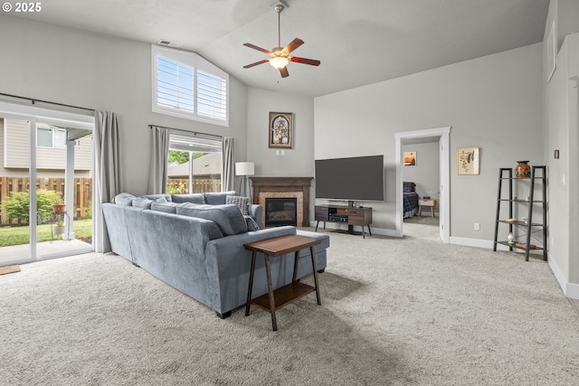 2474 Equestrian Loop S, Salem, OR 97302 - carpeted living area featuring ceiling fan, a glass covered fireplace, and high vaulted ceiling