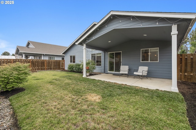2474 Equestrian Loop S, Salem, OR 97302 - back of house featuring a patio area and a fenced backyard
