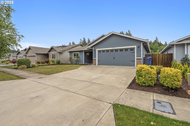 2474 Equestrian Loop S, Salem, OR 97302 - single story home with an attached garage, concrete driveway, and brick siding