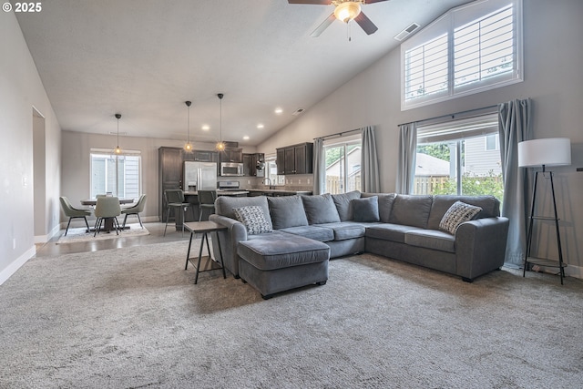 2474 Equestrian Loop S, Salem, OR 97302 - carpeted living room with high vaulted ceiling, ceiling fan, and recessed lighting