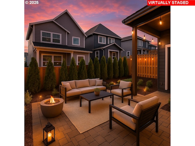 11855 SW Bosley Ter, Beaverton, OR 97007 - fenced backyard with a patio and an outdoor living space with a fire pit
