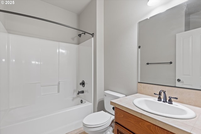 full bathroom featuring vanity, toilet, tub / shower combination, and decorative backsplash