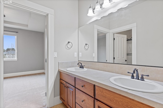 bathroom with vanity and decorative backsplash