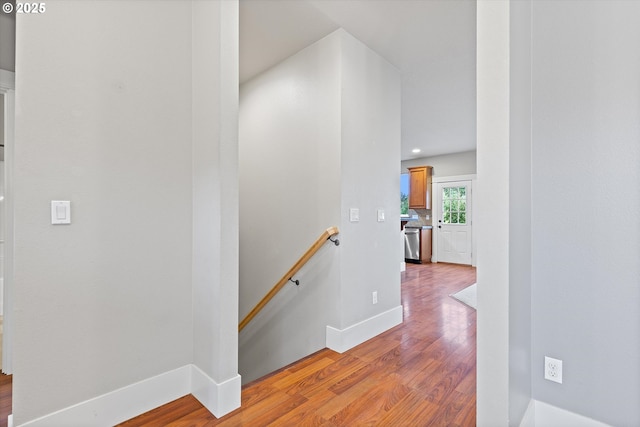 hall with light hardwood / wood-style flooring