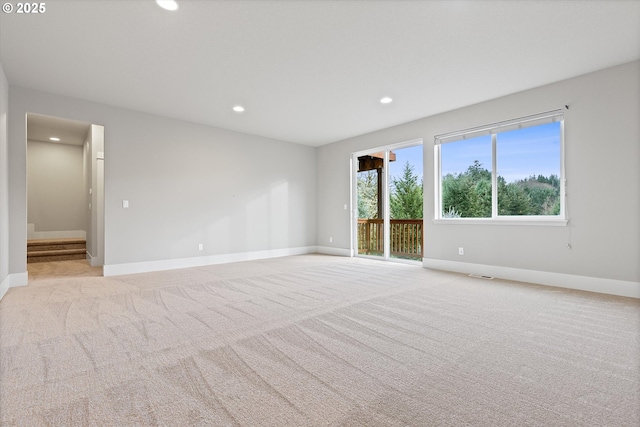 view of carpeted spare room