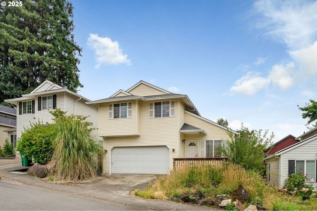 5850 NW 172nd Ter, Portland, OR 97229 - view of front of home featuring a garage and asphalt driveway